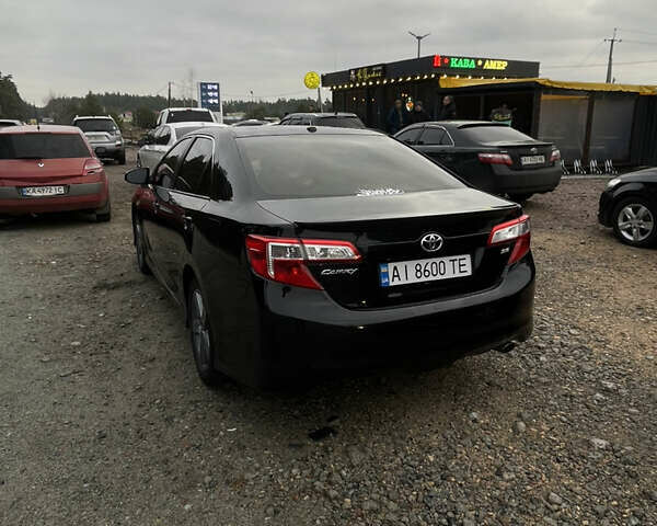 Черный Тойота Камри, объемом двигателя 2.5 л и пробегом 252 тыс. км за 10500 $, фото 8 на Automoto.ua