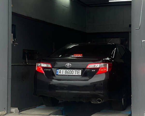 Черный Тойота Камри, объемом двигателя 2.5 л и пробегом 252 тыс. км за 10500 $, фото 3 на Automoto.ua