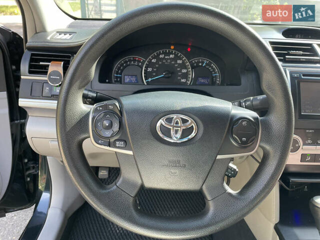 Черный Тойота Камри, объемом двигателя 2.5 л и пробегом 250 тыс. км за 10900 $, фото 10 на Automoto.ua