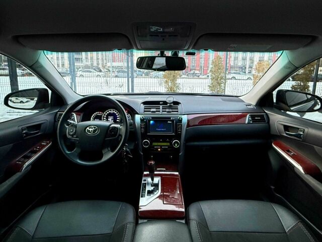 Черный Тойота Камри, объемом двигателя 2.5 л и пробегом 209 тыс. км за 13900 $, фото 19 на Automoto.ua