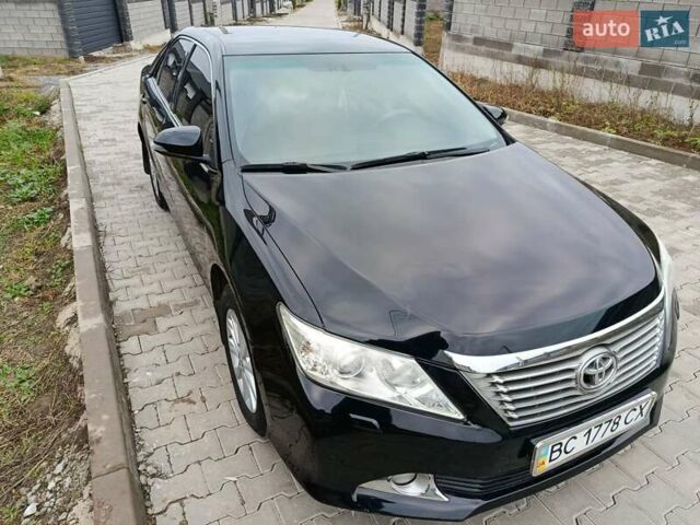 Чорний Тойота Камрі, об'ємом двигуна 2.5 л та пробігом 176 тис. км за 13499 $, фото 2 на Automoto.ua