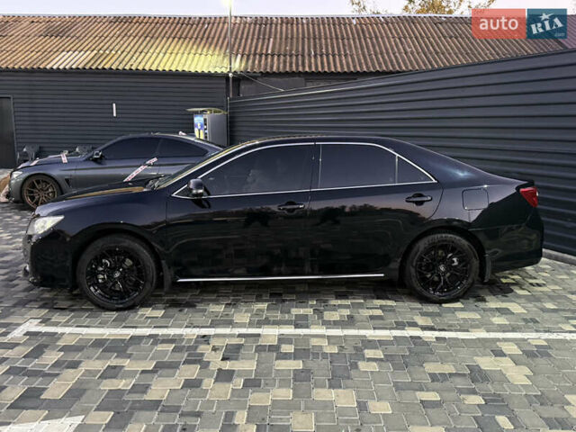 Чорний Тойота Камрі, об'ємом двигуна 2.5 л та пробігом 216 тис. км за 13000 $, фото 2 на Automoto.ua