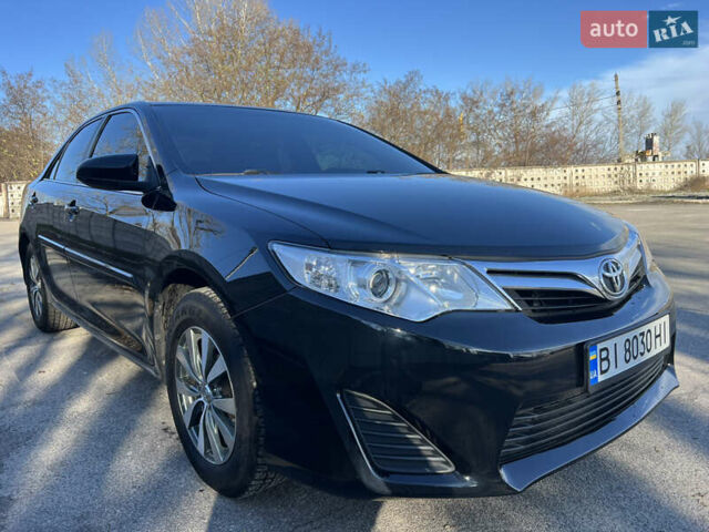 Чорний Тойота Камрі, об'ємом двигуна 2.5 л та пробігом 155 тис. км за 12000 $, фото 1 на Automoto.ua