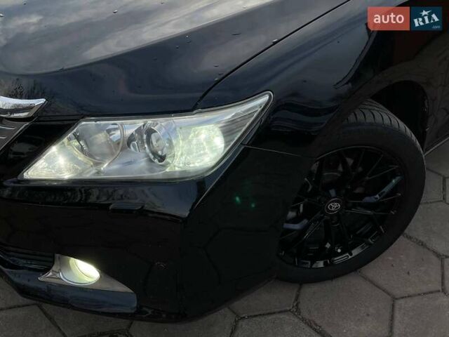 Черный Тойота Камри, объемом двигателя 2.49 л и пробегом 216 тыс. км за 13999 $, фото 1 на Automoto.ua