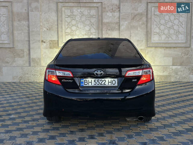 Черный Тойота Камри, объемом двигателя 2.5 л и пробегом 215 тыс. км за 11950 $, фото 12 на Automoto.ua