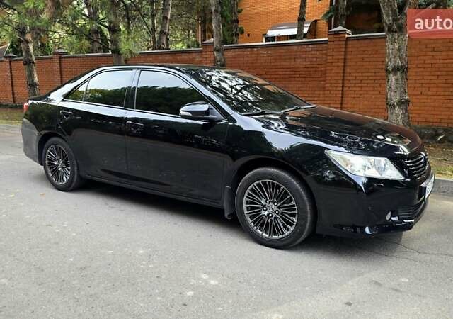 Черный Тойота Камри, объемом двигателя 2.49 л и пробегом 258 тыс. км за 12800 $, фото 13 на Automoto.ua