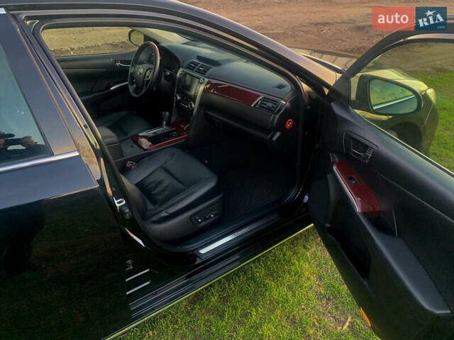 Чорний Тойота Камрі, об'ємом двигуна 2.5 л та пробігом 236 тис. км за 15200 $, фото 17 на Automoto.ua