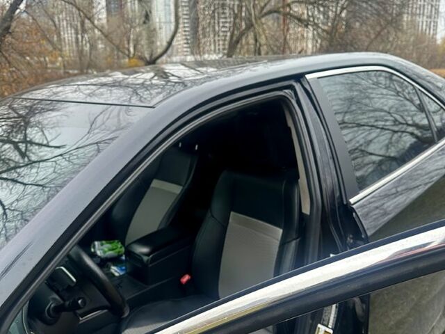 Черный Тойота Камри, объемом двигателя 2.5 л и пробегом 184 тыс. км за 11111 $, фото 4 на Automoto.ua