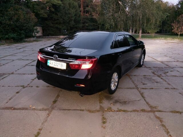 Чорний Тойота Камрі, об'ємом двигуна 2.5 л та пробігом 242 тис. км за 13000 $, фото 1 на Automoto.ua