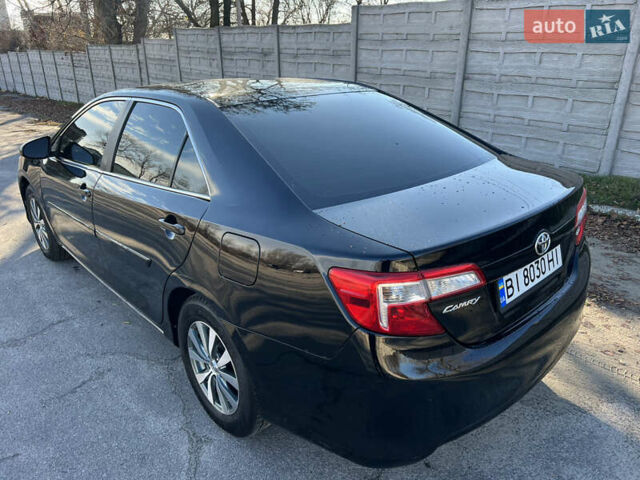 Чорний Тойота Камрі, об'ємом двигуна 2.5 л та пробігом 155 тис. км за 12000 $, фото 7 на Automoto.ua
