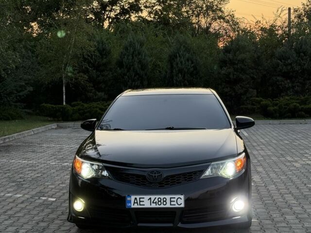 Черный Тойота Камри, объемом двигателя 2.5 л и пробегом 198 тыс. км за 10900 $, фото 20 на Automoto.ua