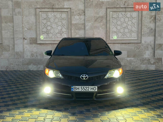 Черный Тойота Камри, объемом двигателя 2.5 л и пробегом 215 тыс. км за 11950 $, фото 9 на Automoto.ua