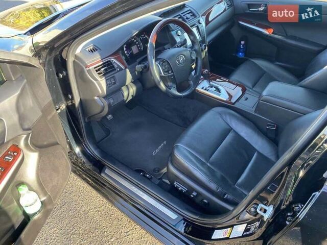 Чорний Тойота Камрі, об'ємом двигуна 2.5 л та пробігом 96 тис. км за 15500 $, фото 21 на Automoto.ua