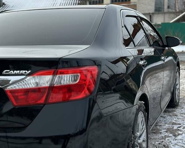 Черный Тойота Камри, объемом двигателя 2.5 л и пробегом 283 тыс. км за 11800 $, фото 14 на Automoto.ua