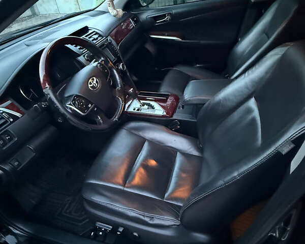 Черный Тойота Камри, объемом двигателя 2.5 л и пробегом 173 тыс. км за 13350 $, фото 5 на Automoto.ua