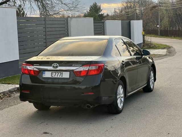 Черный Тойота Камри, объемом двигателя 2.5 л и пробегом 235 тыс. км за 10200 $, фото 2 на Automoto.ua