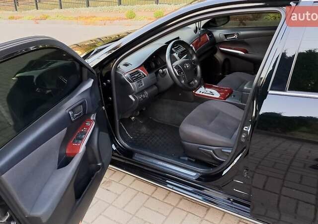 Черный Тойота Камри, объемом двигателя 2.49 л и пробегом 188 тыс. км за 12700 $, фото 14 на Automoto.ua