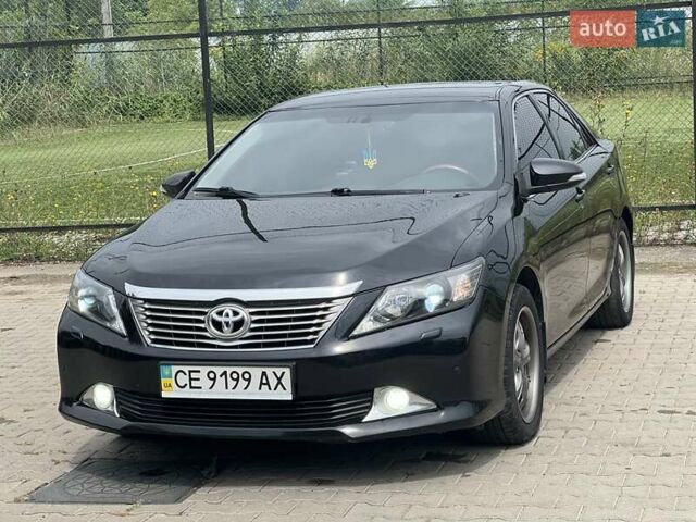 Черный Тойота Камри, объемом двигателя 2.5 л и пробегом 212 тыс. км за 12500 $, фото 4 на Automoto.ua