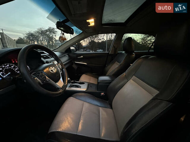 Черный Тойота Камри, объемом двигателя 2.5 л и пробегом 215 тыс. км за 11950 $, фото 25 на Automoto.ua