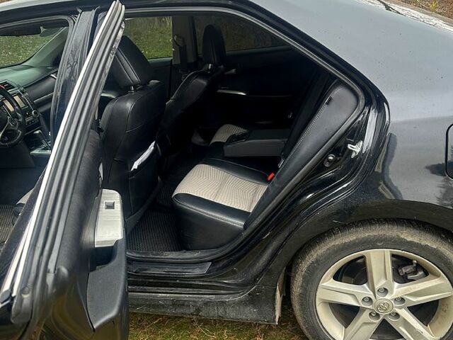 Черный Тойота Камри, объемом двигателя 2.5 л и пробегом 184 тыс. км за 11111 $, фото 5 на Automoto.ua