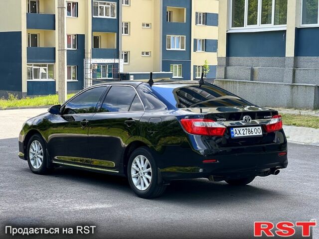 Чорний Тойота Камрі, об'ємом двигуна 2.5 л та пробігом 250 тис. км за 13500 $, фото 5 на Automoto.ua