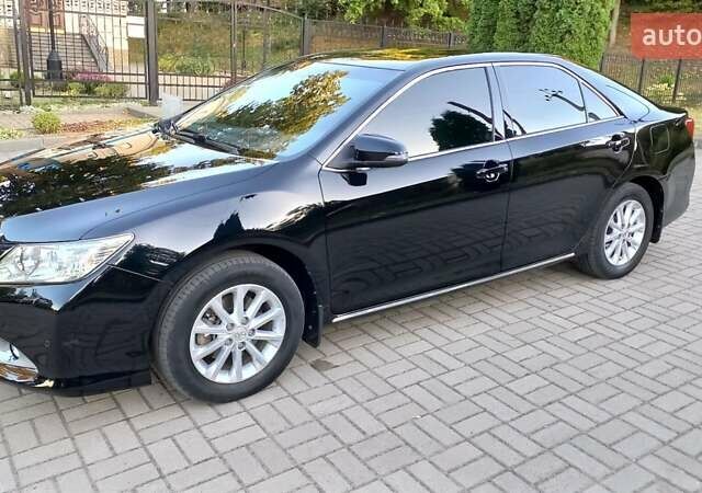 Черный Тойота Камри, объемом двигателя 2.49 л и пробегом 188 тыс. км за 12700 $, фото 3 на Automoto.ua