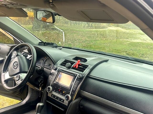 Черный Тойота Камри, объемом двигателя 2.5 л и пробегом 184 тыс. км за 11111 $, фото 3 на Automoto.ua