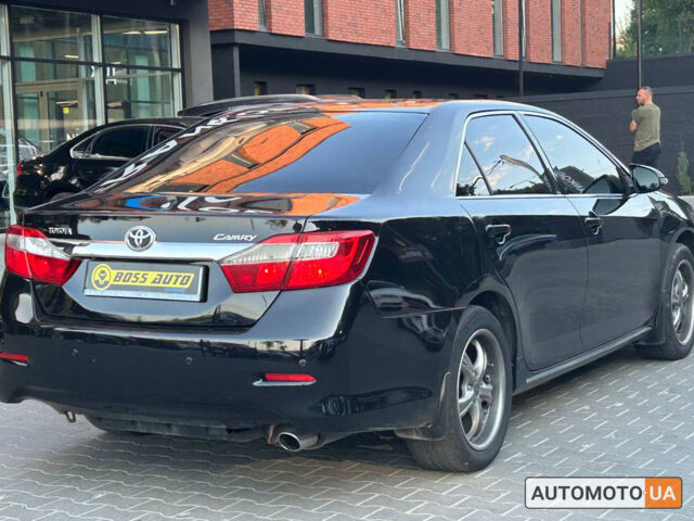 Черный Тойота Камри, объемом двигателя 2.5 л и пробегом 211 тыс. км за 12700 $, фото 5 на Automoto.ua