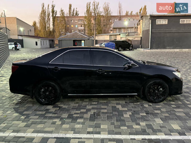 Чорний Тойота Камрі, об'ємом двигуна 2.5 л та пробігом 216 тис. км за 13000 $, фото 3 на Automoto.ua