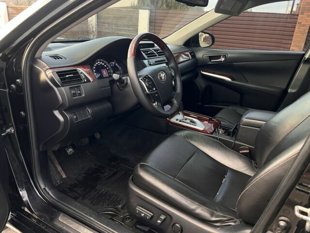 Черный Тойота Камри, объемом двигателя 2.5 л и пробегом 235 тыс. км за 10200 $, фото 4 на Automoto.ua