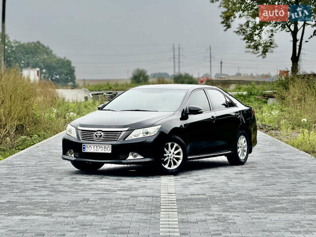 Черный Тойота Камри, объемом двигателя 2.5 л и пробегом 260 тыс. км за 10999 $, фото 15 на Automoto.ua