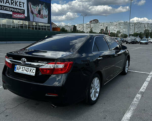 Черный Тойота Камри, объемом двигателя 2.49 л и пробегом 249 тыс. км за 14750 $, фото 4 на Automoto.ua