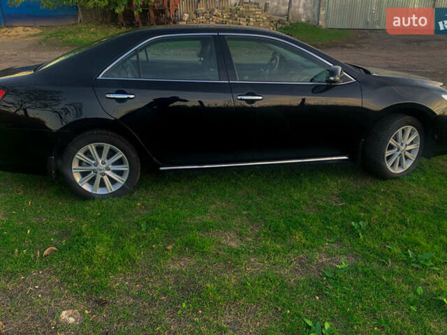 Чорний Тойота Камрі, об'ємом двигуна 2.5 л та пробігом 236 тис. км за 15200 $, фото 4 на Automoto.ua