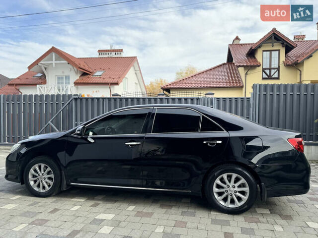 Черный Тойота Камри, объемом двигателя 2.5 л и пробегом 255 тыс. км за 13500 $, фото 10 на Automoto.ua
