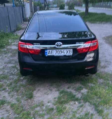 Чорний Тойота Камрі, об'ємом двигуна 2.5 л та пробігом 200 тис. км за 13500 $, фото 2 на Automoto.ua