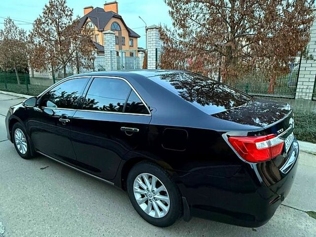 Черный Тойота Камри, объемом двигателя 2.5 л и пробегом 173 тыс. км за 14550 $, фото 1 на Automoto.ua