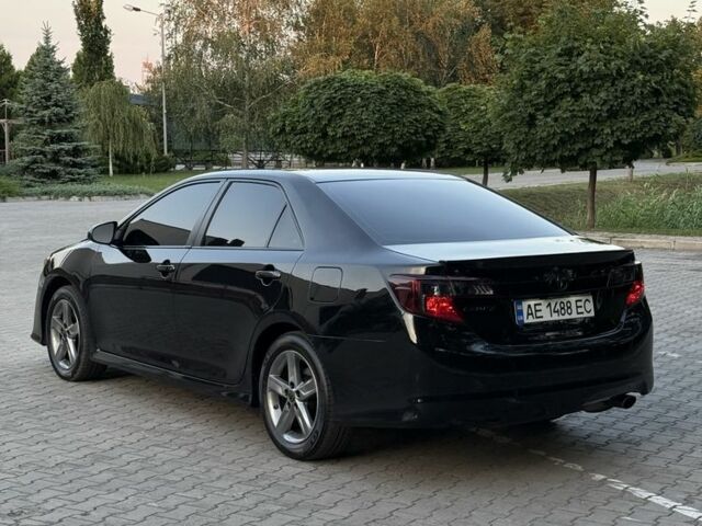 Черный Тойота Камри, объемом двигателя 2.5 л и пробегом 198 тыс. км за 10900 $, фото 4 на Automoto.ua