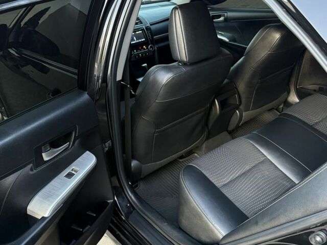 Черный Тойота Камри, объемом двигателя 2.5 л и пробегом 198 тыс. км за 10900 $, фото 16 на Automoto.ua