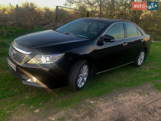 Чорний Тойота Камрі, об'ємом двигуна 2.5 л та пробігом 236 тис. км за 15200 $, фото 2 на Automoto.ua