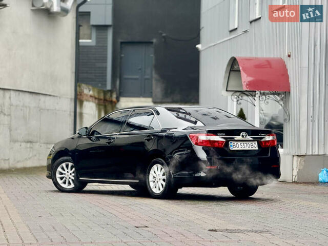 Чорний Тойота Камрі, об'ємом двигуна 2.5 л та пробігом 251 тис. км за 10999 $, фото 31 на Automoto.ua