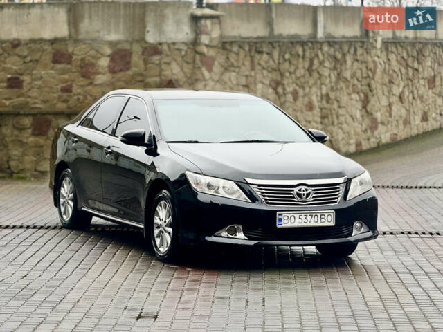 Чорний Тойота Камрі, об'ємом двигуна 2.5 л та пробігом 251 тис. км за 10999 $, фото 1 на Automoto.ua