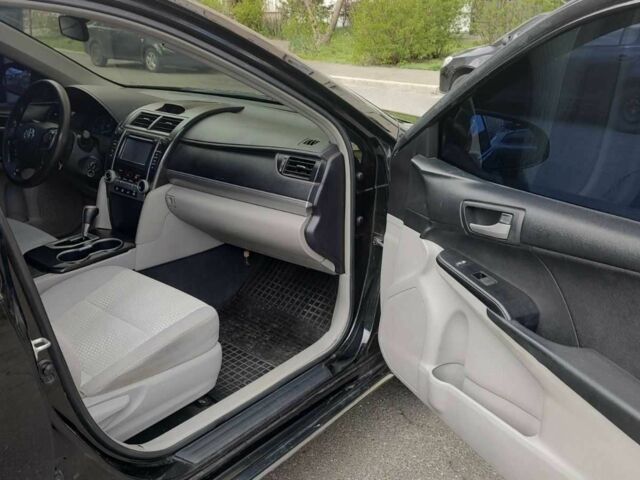 Черный Тойота Камри, объемом двигателя 2.5 л и пробегом 290 тыс. км за 9500 $, фото 9 на Automoto.ua