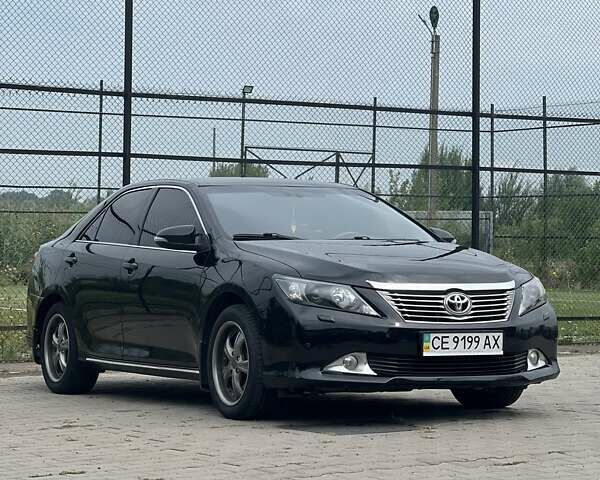 Черный Тойота Камри, объемом двигателя 2.5 л и пробегом 212 тыс. км за 12500 $, фото 5 на Automoto.ua
