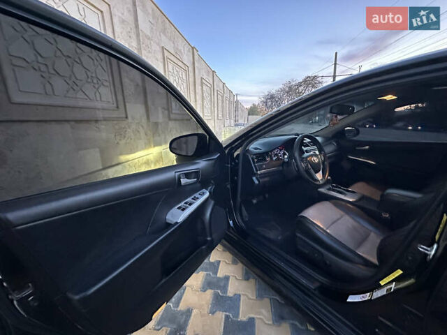 Черный Тойота Камри, объемом двигателя 2.5 л и пробегом 215 тыс. км за 11950 $, фото 24 на Automoto.ua