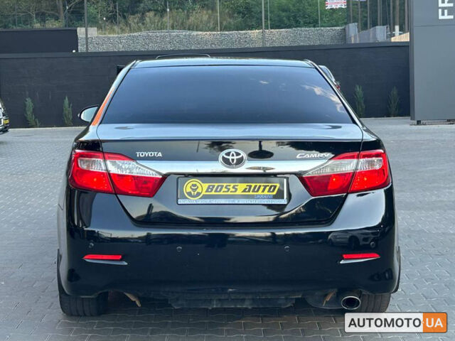 Черный Тойота Камри, объемом двигателя 2.5 л и пробегом 211 тыс. км за 12700 $, фото 4 на Automoto.ua