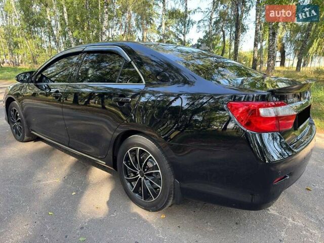 Чорний Тойота Камрі, об'ємом двигуна 2.5 л та пробігом 163 тис. км за 13199 $, фото 23 на Automoto.ua