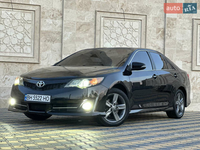 Черный Тойота Камри, объемом двигателя 2.5 л и пробегом 215 тыс. км за 11950 $, фото 21 на Automoto.ua