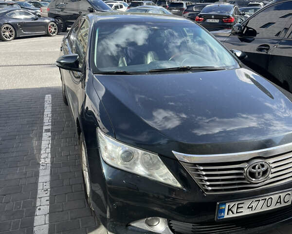 Черный Тойота Камри, объемом двигателя 2.5 л и пробегом 280 тыс. км за 11600 $, фото 1 на Automoto.ua