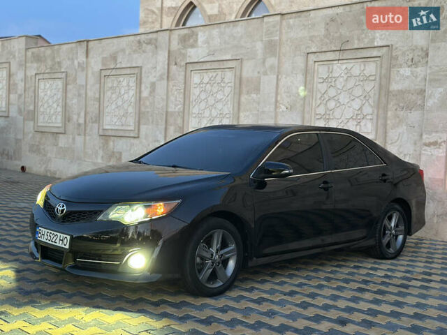 Черный Тойота Камри, объемом двигателя 2.5 л и пробегом 215 тыс. км за 11950 $, фото 10 на Automoto.ua