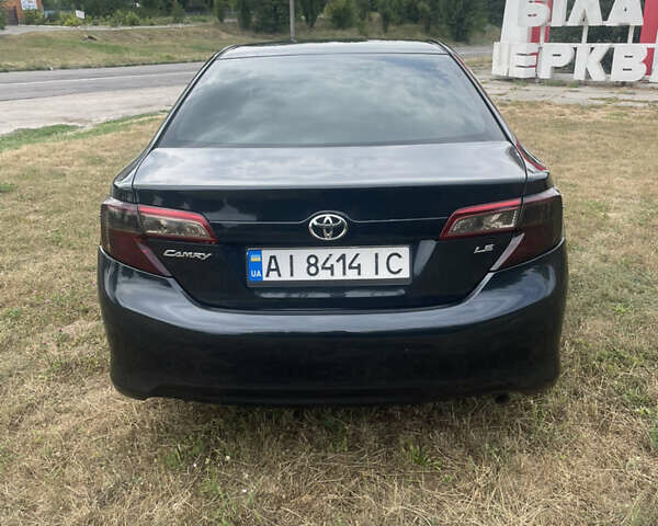 Черный Тойота Камри, объемом двигателя 2.5 л и пробегом 250 тыс. км за 10900 $, фото 12 на Automoto.ua